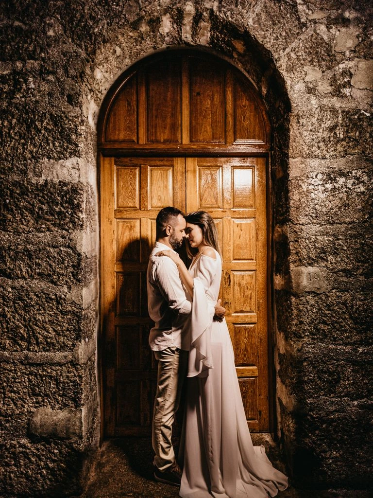 A real couple booked through Hardcore Sweethearts, photographed in a Brooklyn warehouse venue.